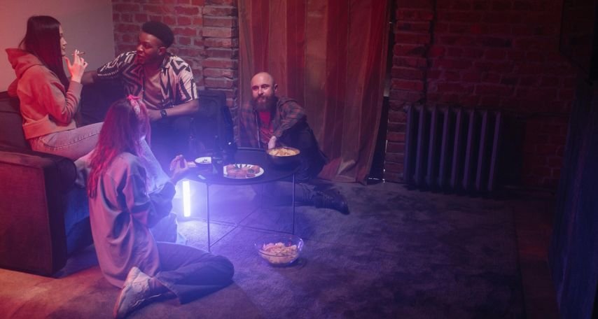 Group of People Hanging Out Inside a Room