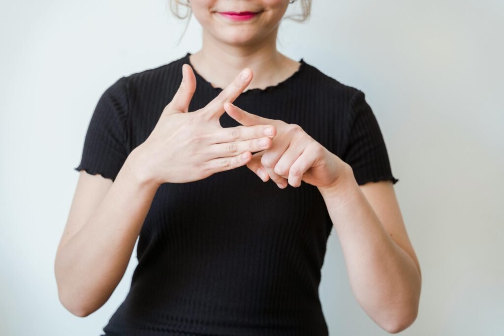 A lady using sign language